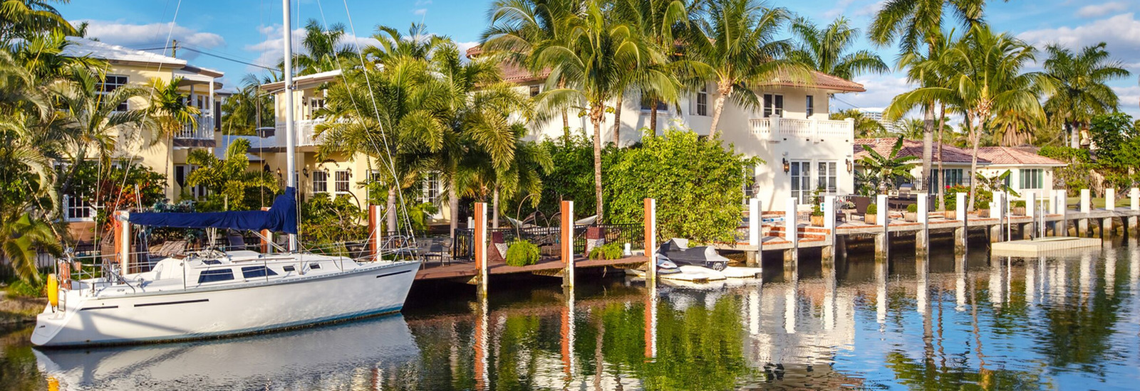 Homes on the river with a boat