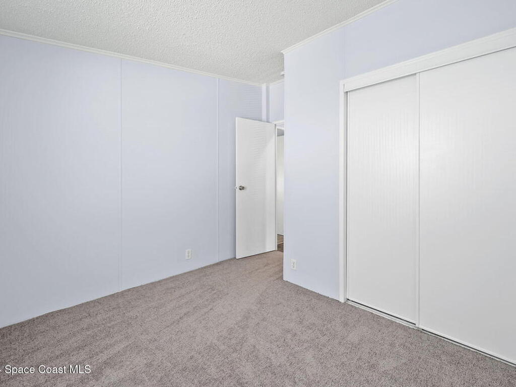 1039 Royal Palm Drive, Barefoot Bay, FL 32976
