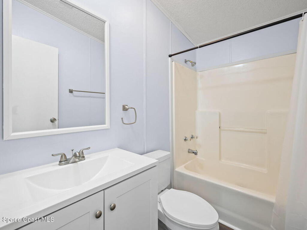 1039 Royal Palm Drive, Barefoot Bay, FL 32976