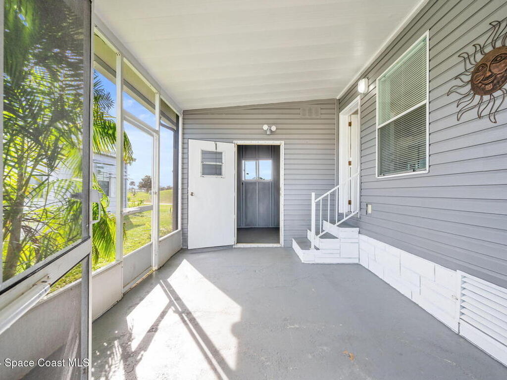 1039 Royal Palm Drive, Barefoot Bay, FL 32976