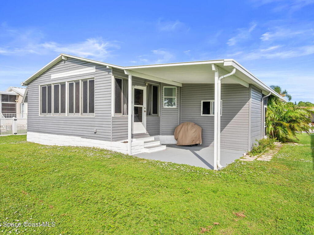 1039 Royal Palm Drive, Barefoot Bay, FL 32976