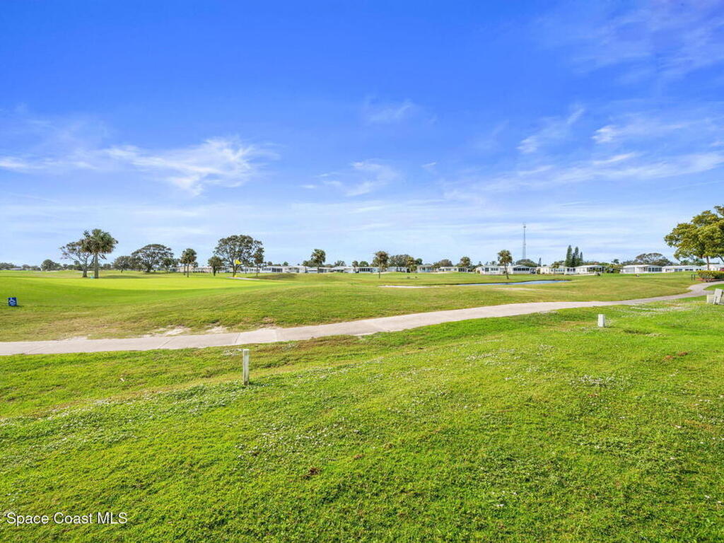 1039 Royal Palm Drive, Barefoot Bay, FL 32976