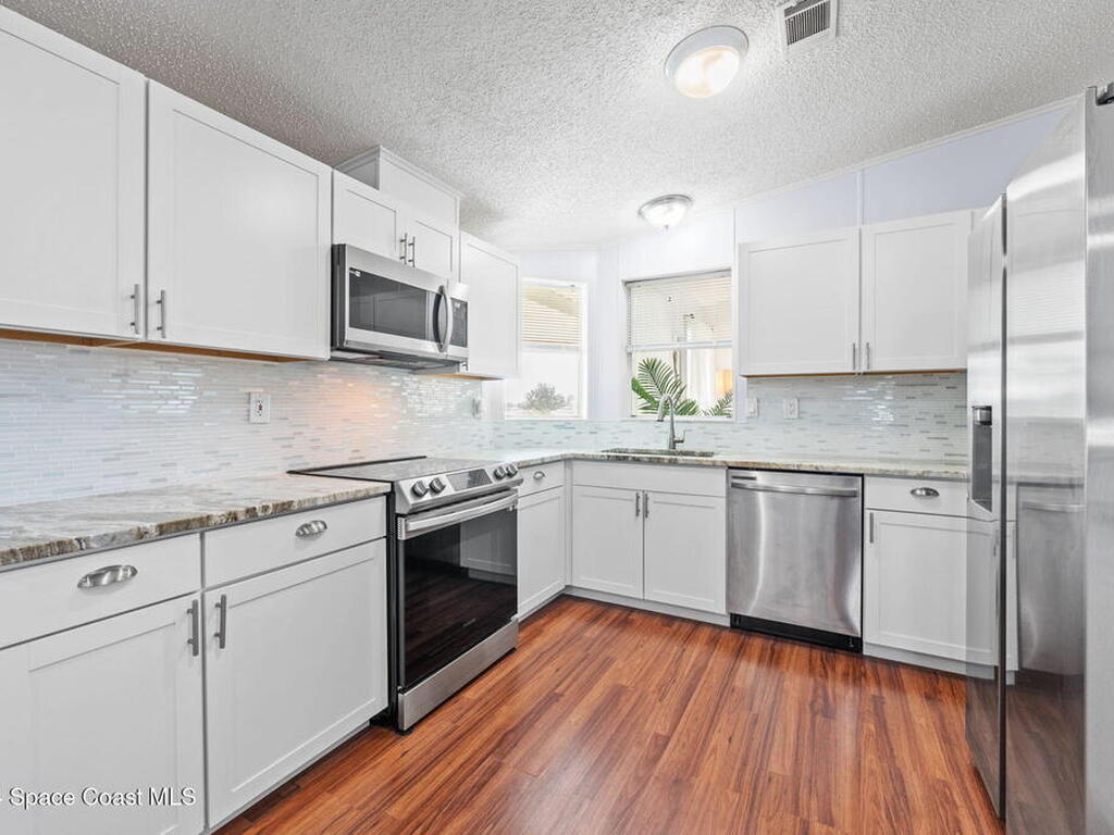 1039 Royal Palm Drive, Barefoot Bay, FL 32976