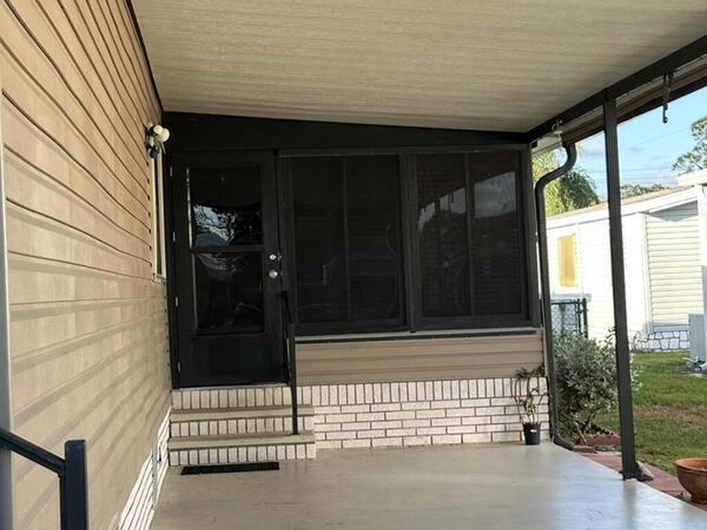 602 Dolphin Circle, Barefoot Bay, FL 32976