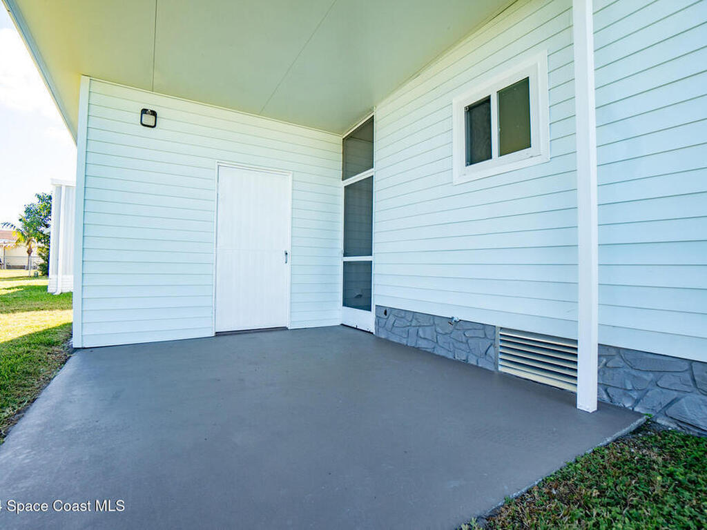 1044 Thrush Circle, Barefoot Bay, FL 32976