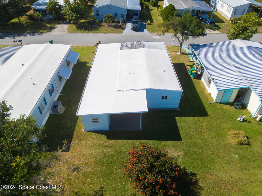 1044 Thrush Circle, Barefoot Bay, FL 32976
