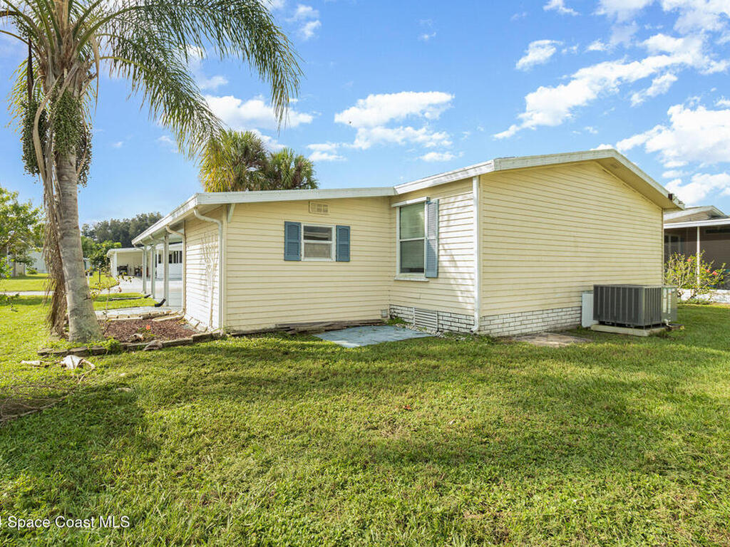 342 Macadamia Drive, Barefoot Bay, FL 32976