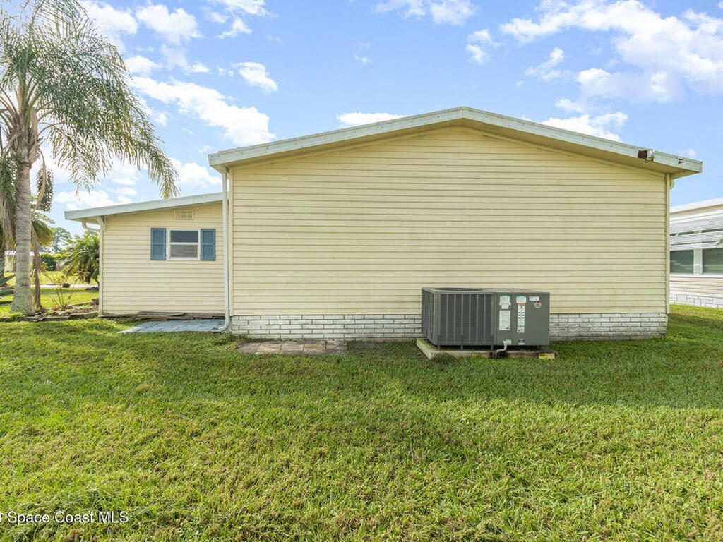 342 Macadamia Drive, Barefoot Bay, FL 32976