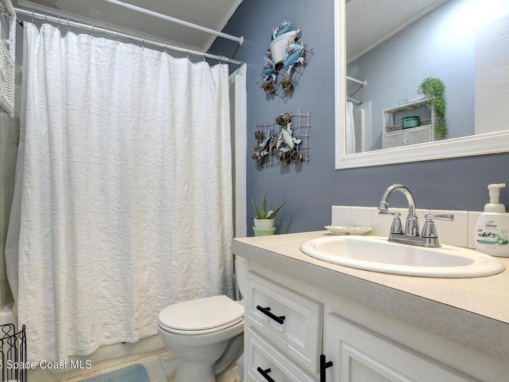 208 Calico Court, Barefoot Bay, FL 32976