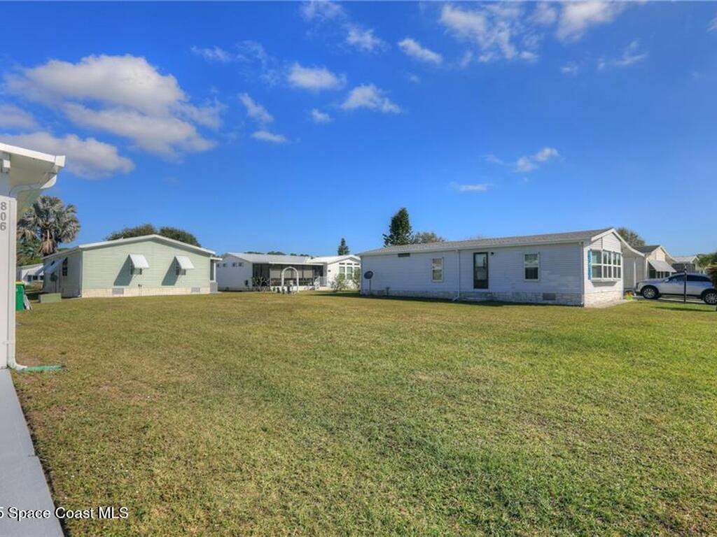 806 Lychee Drive, Barefoot Bay, FL 32976