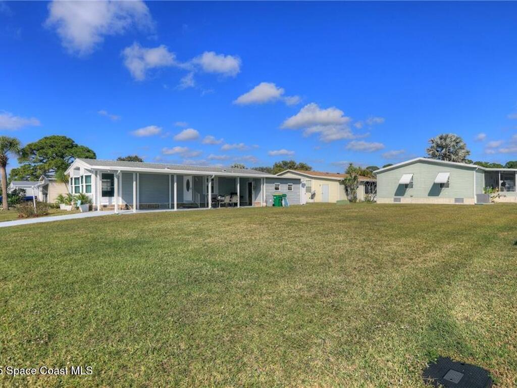 806 Lychee Drive, Barefoot Bay, FL 32976