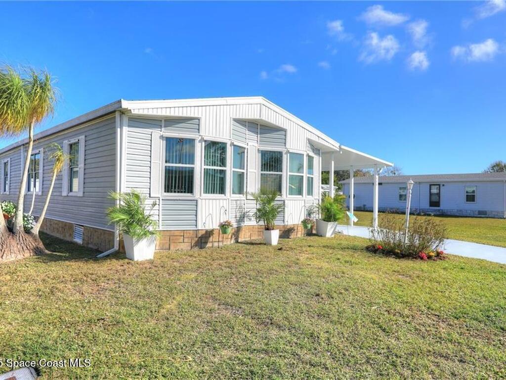806 Lychee Drive, Barefoot Bay, FL 32976