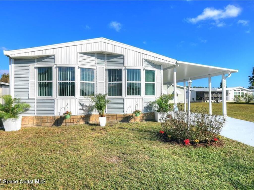 806 Lychee Drive, Barefoot Bay, FL 32976