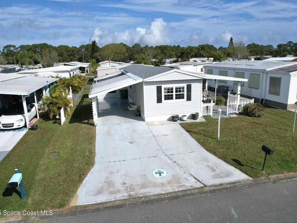 1058 Royal Palm Drive, Barefoot Bay, FL 32976