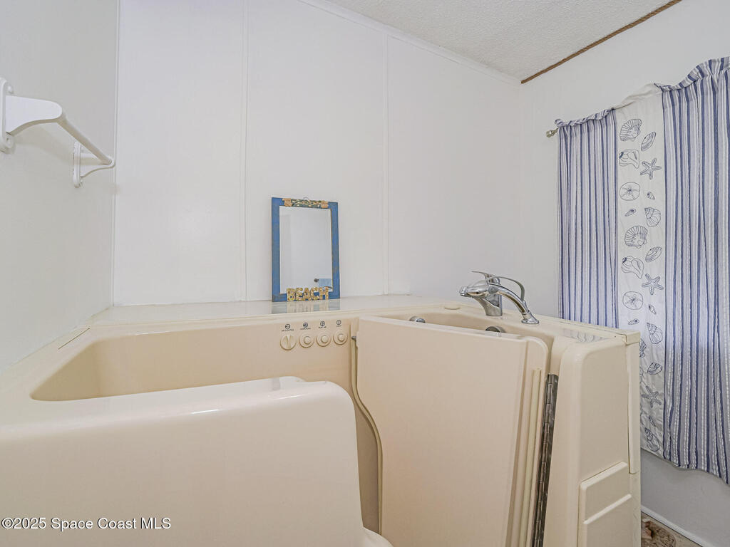 206 Almond Court, Barefoot Bay, FL 32976