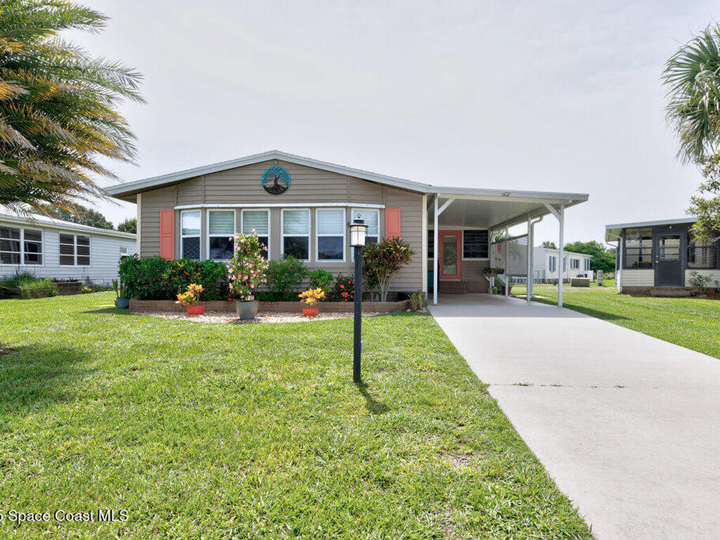 602 Wedelia Drive, Barefoot Bay, FL 32976