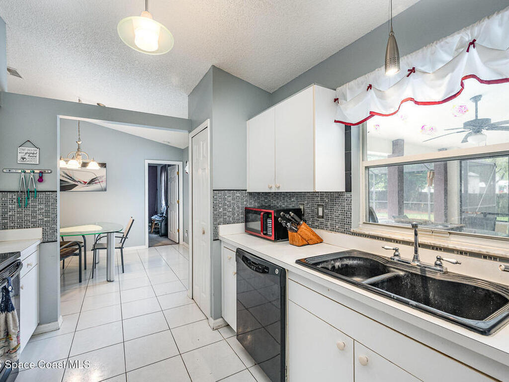 7711 Greenboro Drive, Melbourne, FL 32904