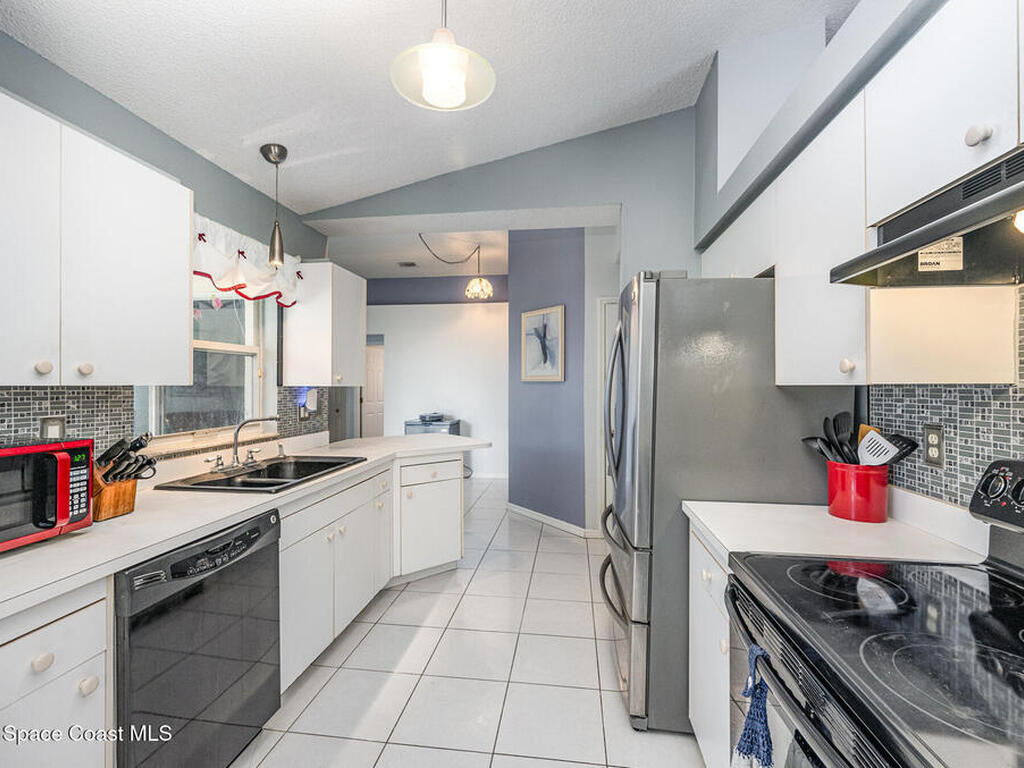 7711 Greenboro Drive, Melbourne, FL 32904