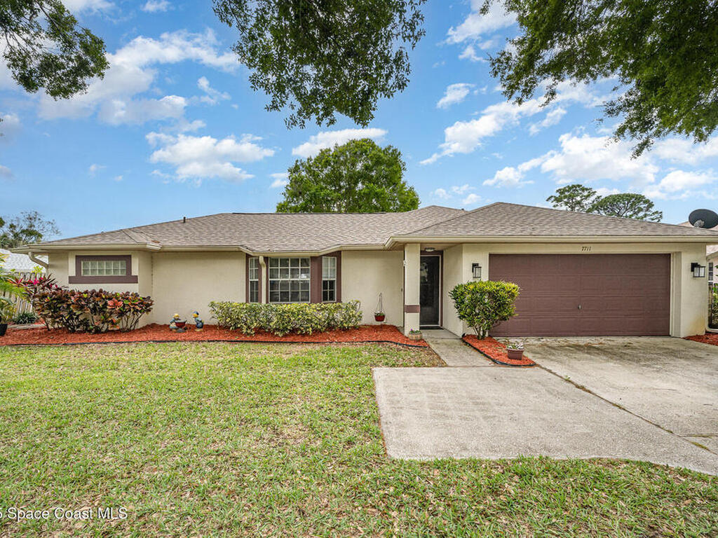 7711 Greenboro Drive, Melbourne, FL 32904