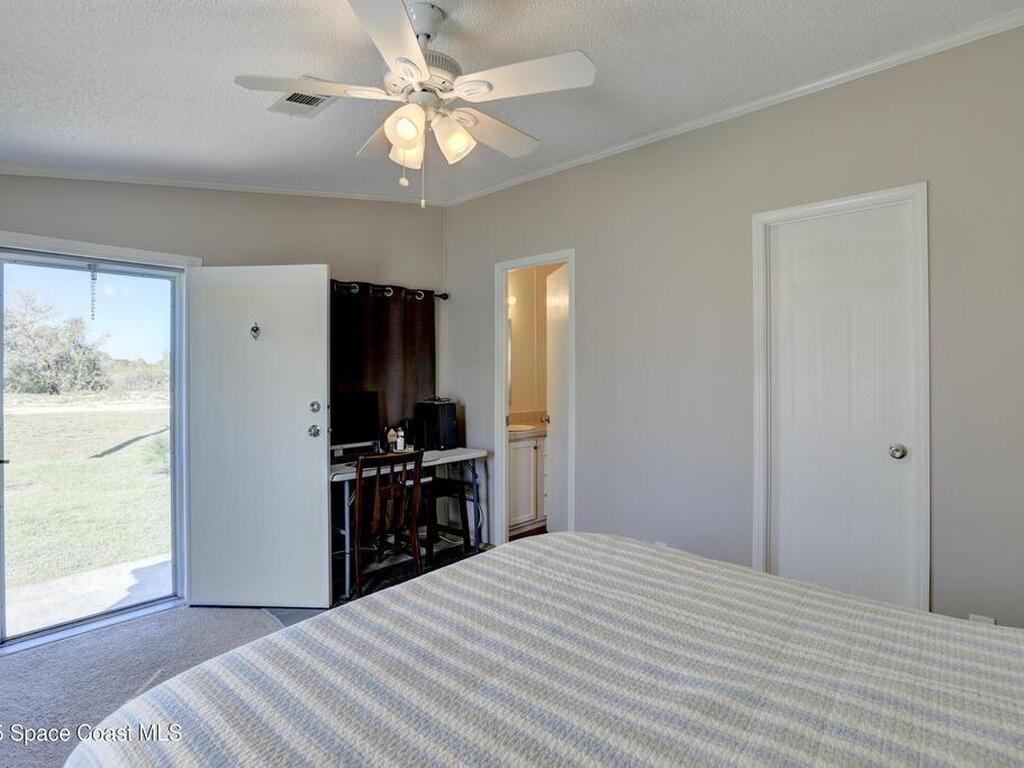 1055 Wren Circle, Barefoot Bay, FL 32976