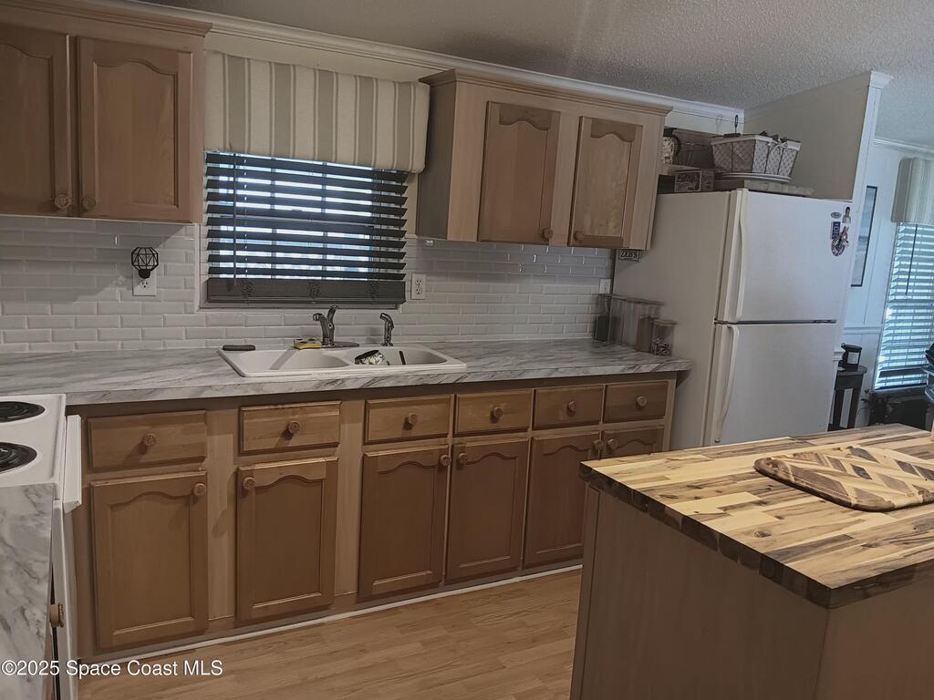1007 Barefoot Circle, Barefoot Bay, FL 32976