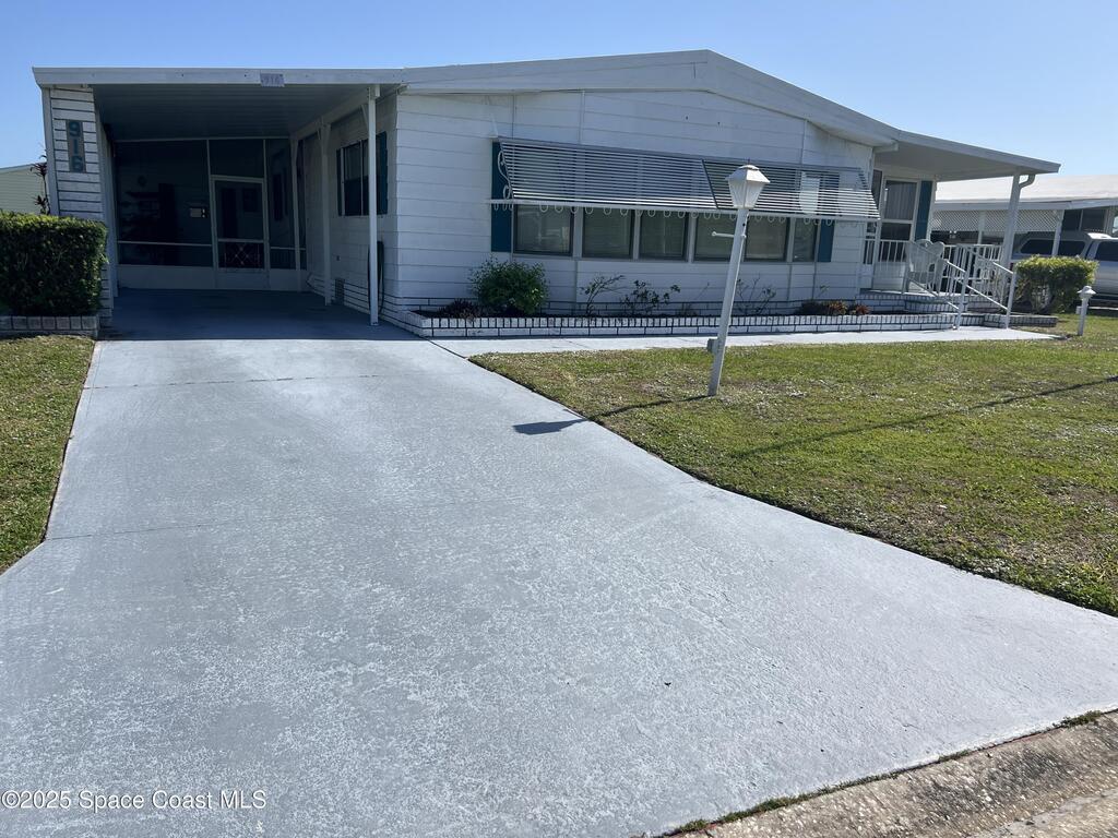 916 Dogwood Drive, Barefoot Bay, FL 32976