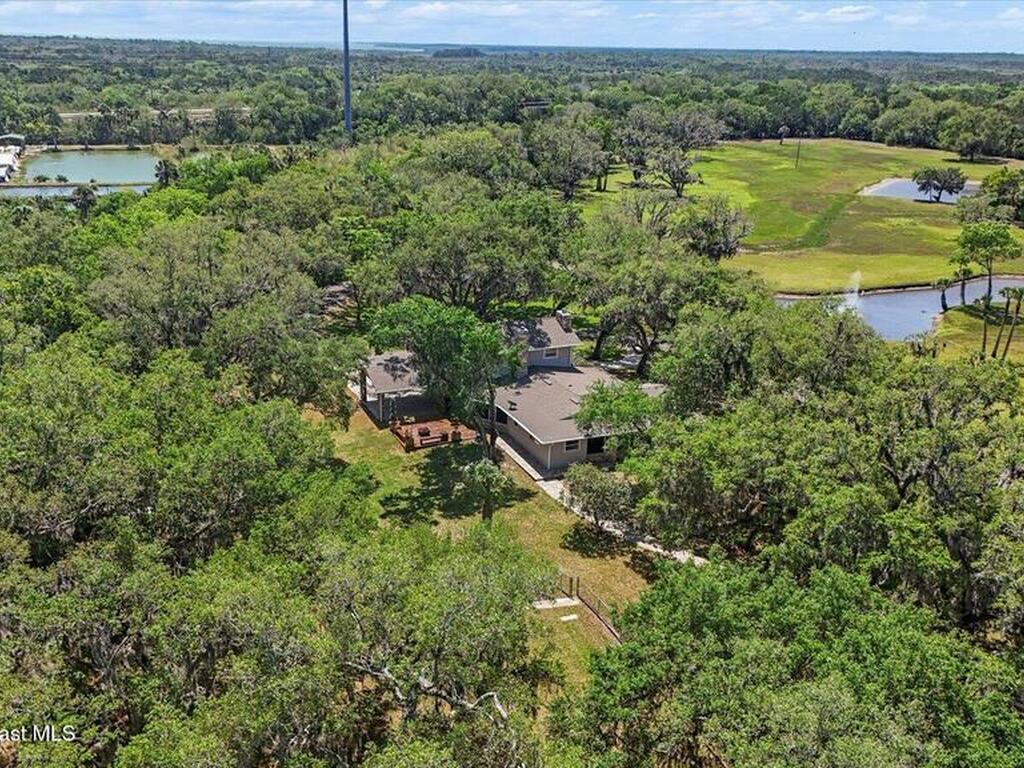 800 Hidden Oaks Lane, Oak Hill, FL 32759
