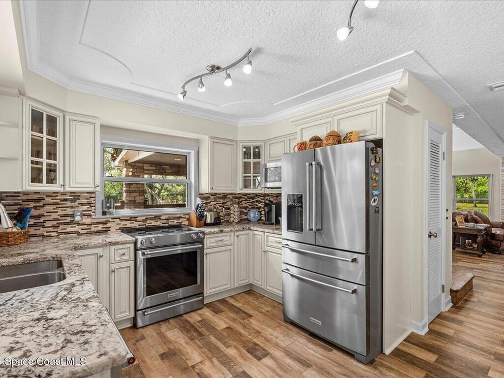 800 Hidden Oaks Lane, Oak Hill, FL 32759