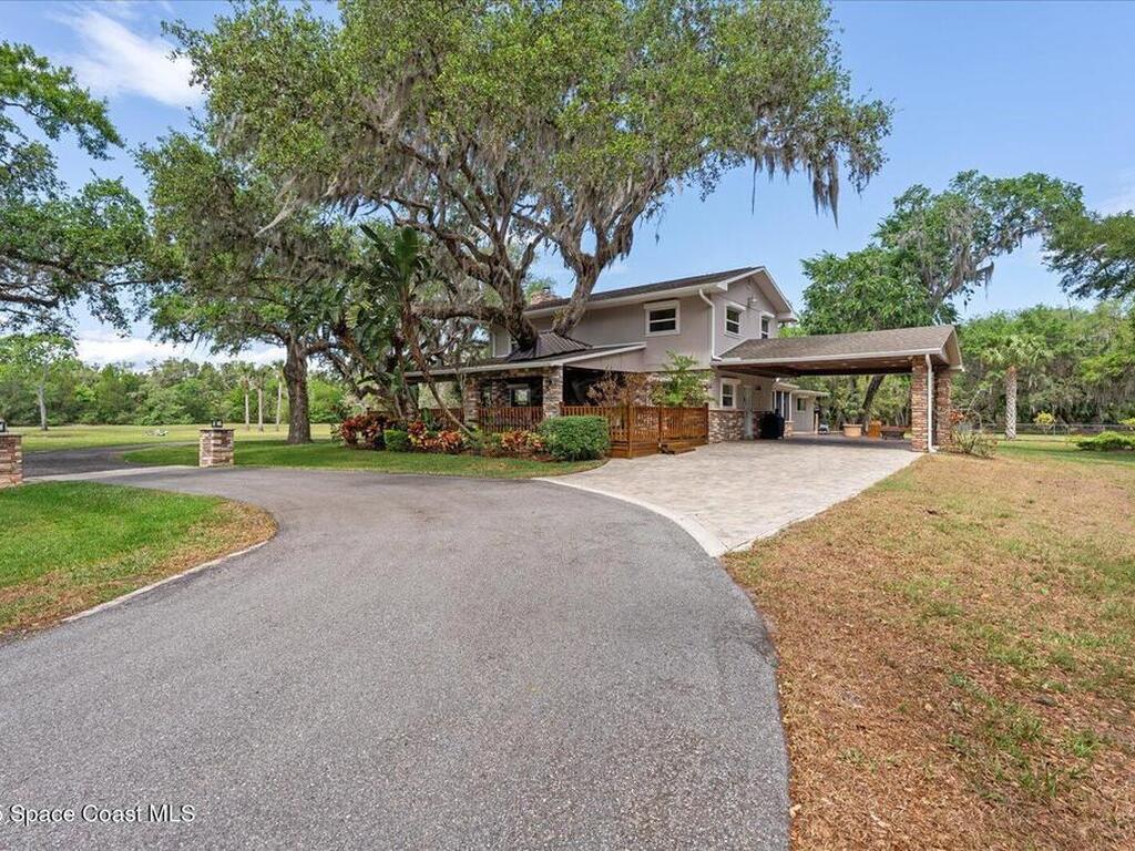 800 Hidden Oaks Lane, Oak Hill, FL 32759