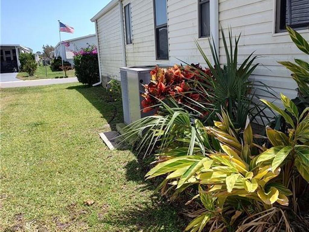 451 Papaya Circle, Barefoot Bay, FL 32976