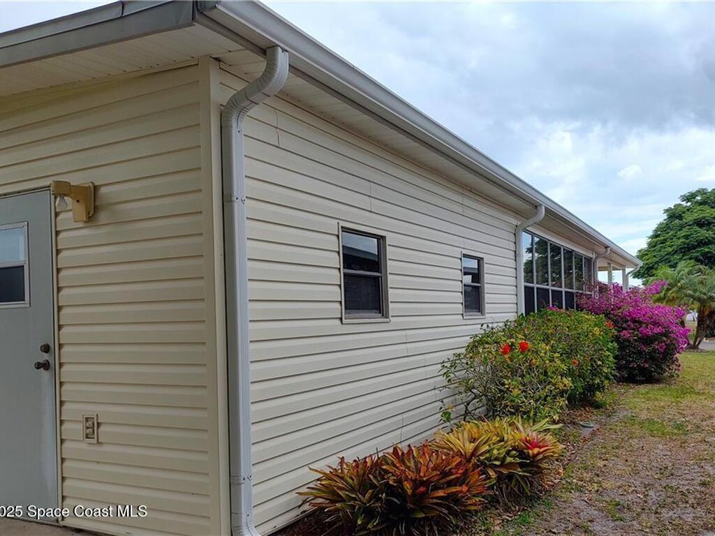 451 Papaya Circle, Barefoot Bay, FL 32976