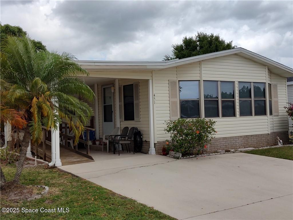 451 Papaya Circle, Barefoot Bay, FL 32976