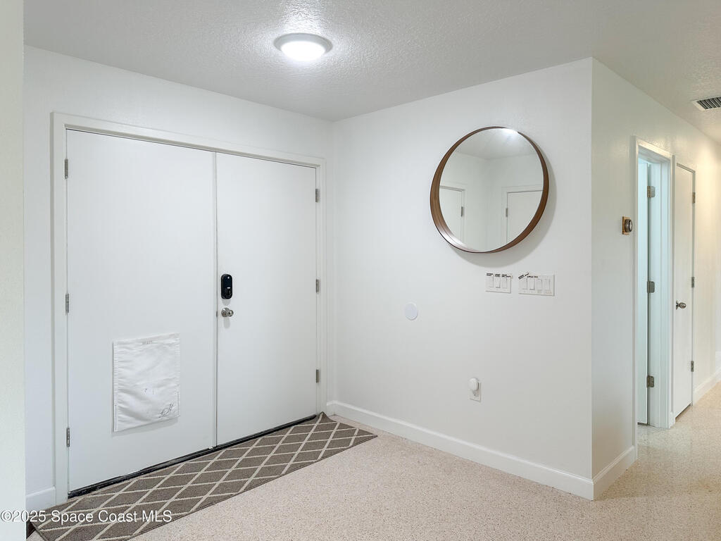 234 Micanopy Court, Indian Harbour Beach, FL 32937