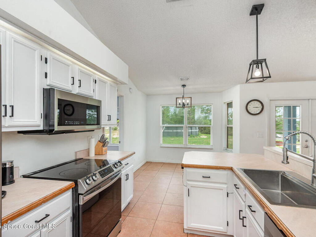 4265 Robins Hill Court, Mims, FL 32754