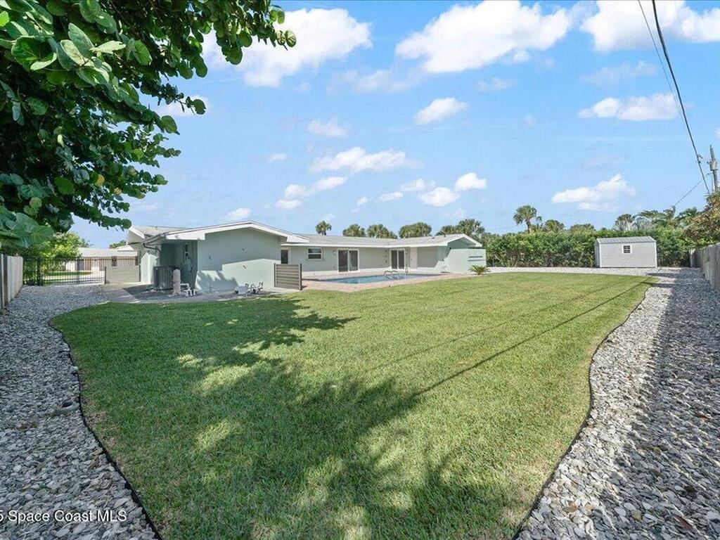 303 Hibiscus Trail, Melbourne Beach, FL 32951