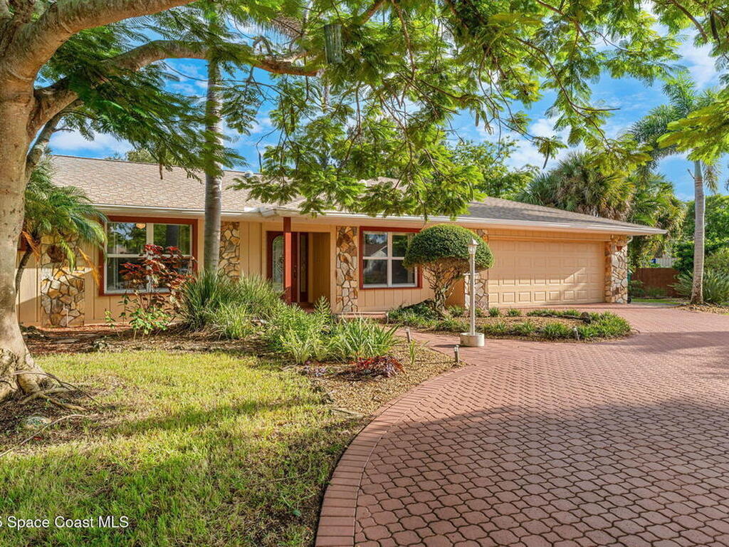 4 Colonial Way, Indian Harbour Beach, FL 32937