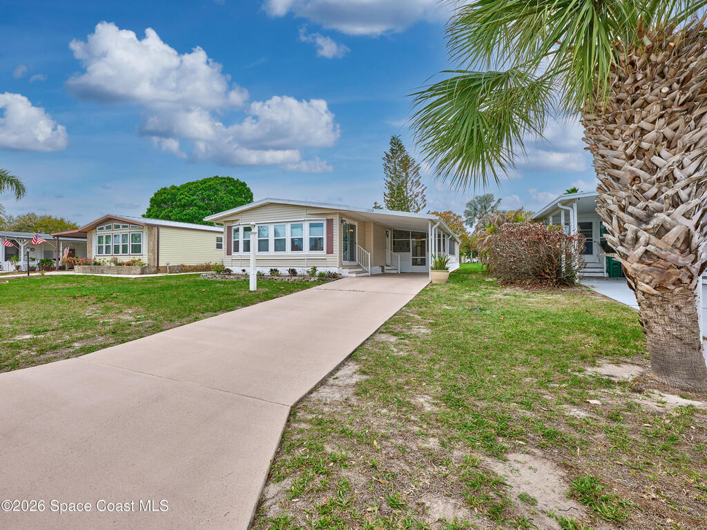 1228 Gardenia Drive, Barefoot Bay, FL 32976